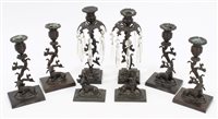 Lot 1044 - Two pairs Regency bronze candlesticks with...