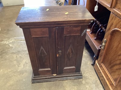 Lot 1288 - Oak cupboard with shelved interior enclosed by panelled door, 46.5cm wide, 25.5cm deep, 59cm high