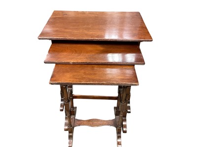 Lot 1306 - Nest of three mahogany occasional tables