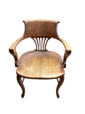 Lot 1315 - Edwardian oak desk chair with pierced splat back