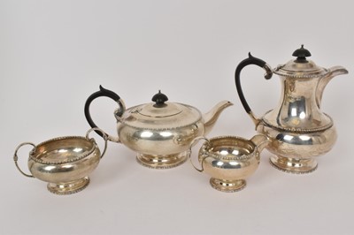 Lot 426 - Early 20th century four piece silver teaset by Walker and Hall