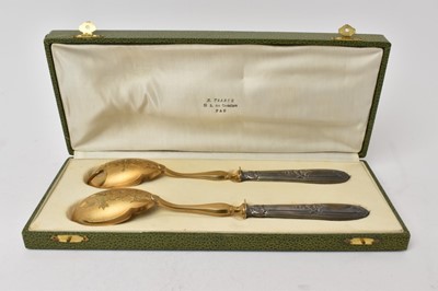 Lot 428 - Pair late 19th/early 20th century French silver/silver gilt salad servers