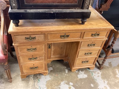 Lot 1320 - Antique pine kneehole desk with nine drawers and central cupboard below, 107cm wide, 51.5cm deep, 75cm high