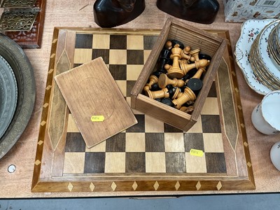 Lot 495 - Wooden chess set together with chess board.