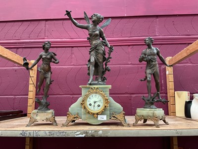 Lot 710 - Antique onyx and spelter figural clock garniture, the clock measuring 60cm high