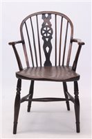 Lot 1729 - Early 19th century yew and elm Windsor chair...