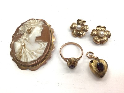 Lot 1078 - 9ct gold mounted cameo brooch, 9ct gold ring, Victorian yellow metal heart pendant and pair of yellow metal flower head ear clips each set with a cultured pearl