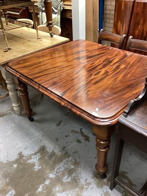 Lot 1354 - Victorian mahogany dining table on turned legs and castors, 124cm x 108cm