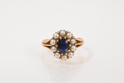 Lot 697 - Sapphire and cultured pearl oval cluster ring