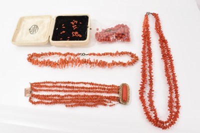 Lot 698 - Regency coral multi-strand bracelet with carved beads on a yellow metal and coral clasp, together with three coral necklaces