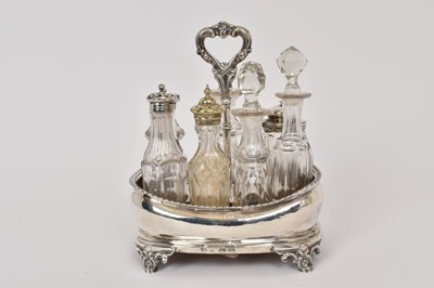 Lot 416 - Victorian silver cruet frame, with assorted cut glass bottles, London 1842