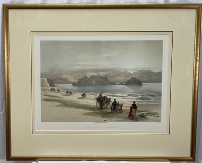 Lot 289 - After David Roberts, pair of coloured prints - Site of Petra and Island of Graia, Gulf of Akabah, 20th century versions, 40cm x 55cm, in glazed gilt frames