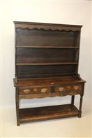 Lot 1737 - Good 18th century oak high dresser of small...