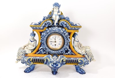 Lot 865 - Late 19th century French faience pottery cased mantel clock, the movement signed 'Jno. Gaydon, Barnstable'