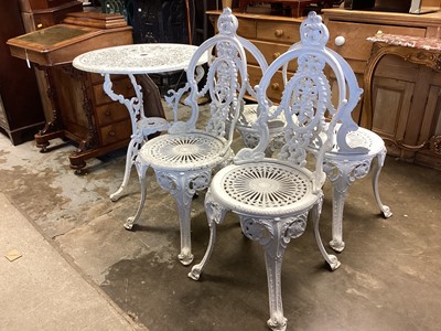 Lot 1380 - White painted metal circular garden table and four matching chairs