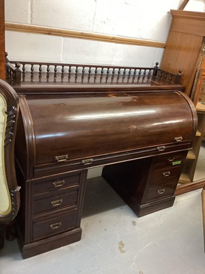 Lot 1398 - Early 20th century mahogany roll top desk with fitted interior and drawers below, 141cm wide, 62cm deep, 121cm high