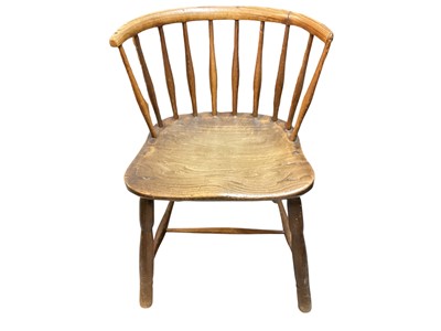 Lot 1402 - 19th century small elm low chair of primitive form, with alterations