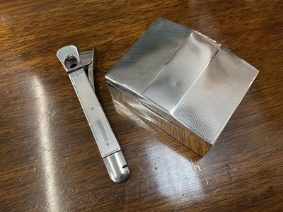 Lot 1066 - Silver cigar cutter and an Art Deco cigarette box