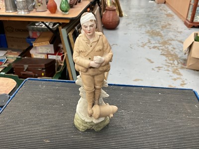 Lot 518 - Unusual bisque porcelain figure of a wounded soldier, possibly Boer War era.