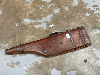 Lot 520 - Antique tan leather leg of mutton gun case.