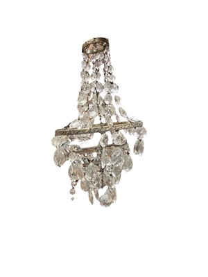 Lot 557 - Ceiling light fitting with prismatic drops.