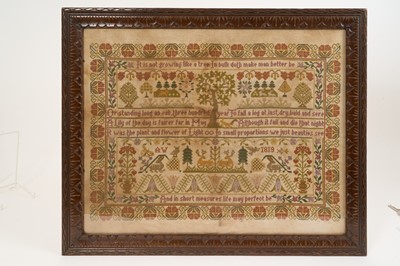 Lot 1172 - Very decorative George III style woolwork sampler, dated 1819 (but later), in glazed frame