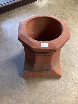 Lot 1453 - Concrete garden figure - Angel, 87cm high together with a blue painted column, 51cm high and a terracotta chimney pot, 45cm high (3)