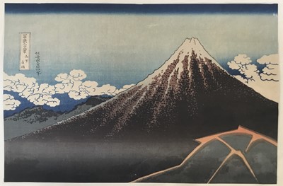 Lot 178 - Two Two Japanese woodblock prints, Hokusai Katsushika and Choshun Miyakawa, Mount Fuji and another - entitled 'Mount Fuji Amidst A Storm and 'On A Journey to Yedo', 20cm x 30cm, unframed