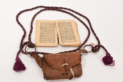 Lot 1097 - Antique leather cased copy of the Quran