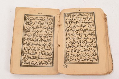 Lot 1097 - Antique leather cased copy of the Quran