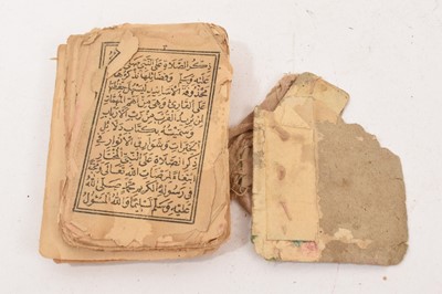 Lot 1097 - Antique leather cased copy of the Quran