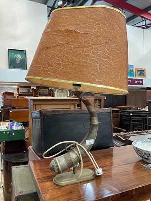 Lot 562 - Eastern metal mounted horn converted into a lamp.