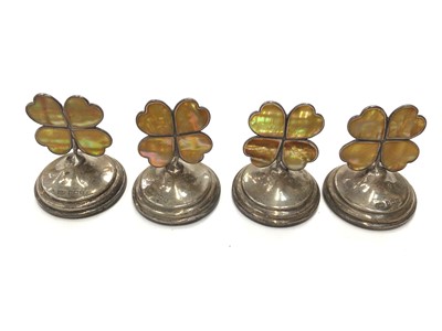 Lot 34 - Set of four silver and mother of pearl four leaf clover shaped menu holders (Birmingham 1911)