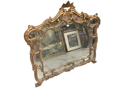 Lot 1469 - Venetian style wall mirror in ornate gilt frame, 120cm high, 125cm wide