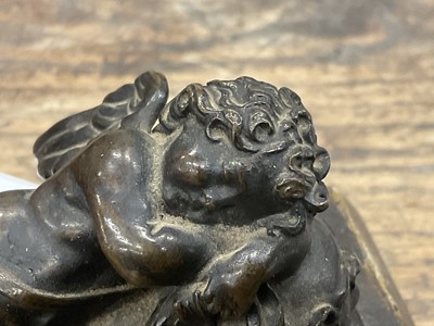 Lot 1104 - Francesco Fanelli (1577-c.1657) bronze - Sleeping Cupid, related paperwork beneath