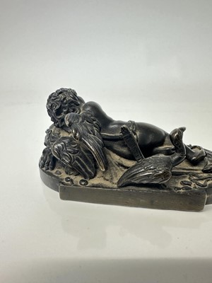 Lot 1104 - Francesco Fanelli (1577-c.1657) bronze - Sleeping Cupid, related paperwork beneath