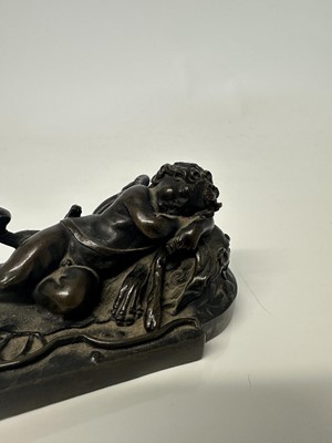 Lot 1104 - Francesco Fanelli (1577-c.1657) bronze - Sleeping Cupid, related paperwork beneath