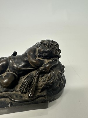 Lot 1104 - Francesco Fanelli (1577-c.1657) bronze - Sleeping Cupid, related paperwork beneath