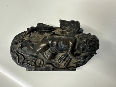 Lot 1104 - Francesco Fanelli (1577-c.1657) bronze - Sleeping Cupid, related paperwork beneath