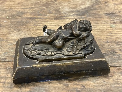 Lot 1104 - Francesco Fanelli (1577-c.1657) bronze - Sleeping Cupid, related paperwork beneath