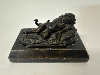 Lot 1104 - Francesco Fanelli (1577-c.1657) bronze - Sleeping Cupid, related paperwork beneath