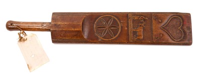 Lot 1103 - Fine continental early 19th century carved fruitwood mangle board