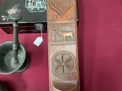 Lot 826 - Fine continental early 19th century carved fruitwood mangle board