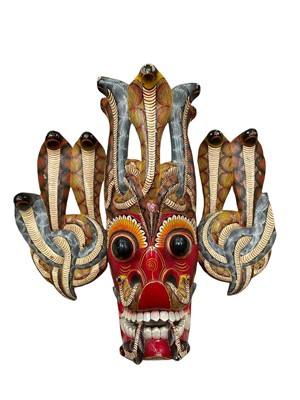 Lot 276 - Painted wooden mask, 43cm high, possibly a Sri Lankan Naga Raksha Mask.