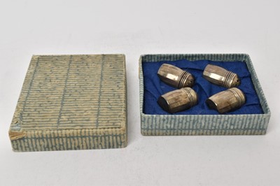 Lot 432 - Set of four American silver miniature salt/pepper pots by SCS Co, in original box.