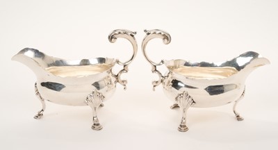 Lot 479 - Pair of George III silver sauce boats