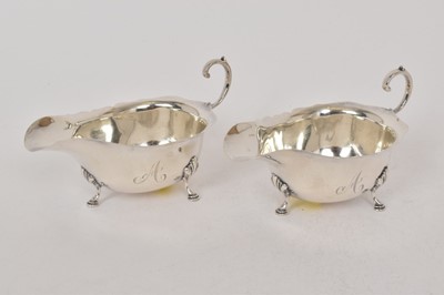 Lot 490 - Pair of 1930s silver sauce boats