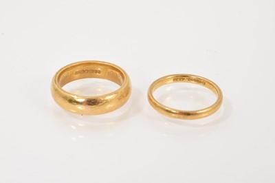 Lot 680 - Two 22ct gold wedding bands