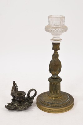 Lot 1131 - Regency period miniature bronze candle/chamber stick, and a Regency bronze falcon candlestick