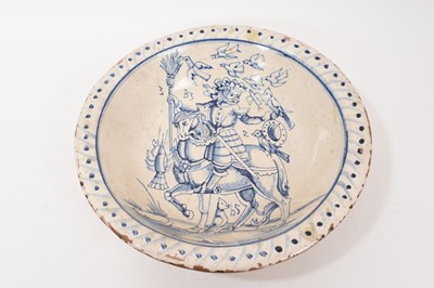 Lot 298 - 18th century continental blue and white tin-glazed bowl, possibly German or Low Countries, decorated with a figure on horseback and various animals, 29.5cm diameter